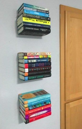 A reviewer’s floating bookshelves mounted on the wall