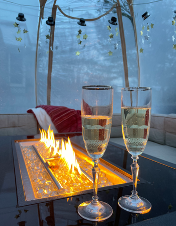 Inside a reviewer's tent placed on their deck