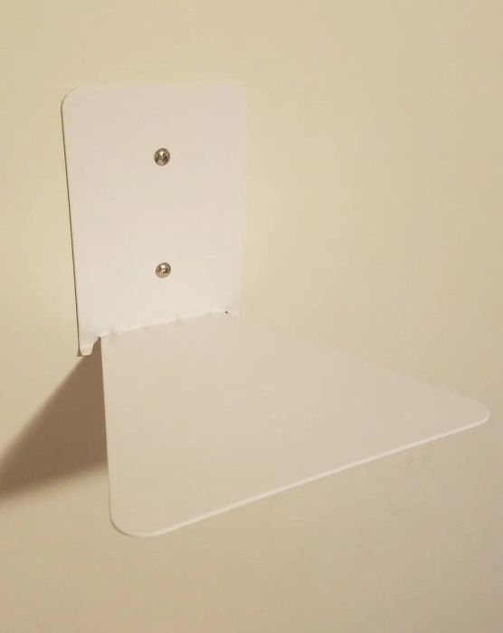 reviewer's photo of an empty floating bookshelf