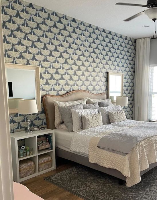 A reviewer’s photo of the peel-and-stick wallpaper in their bedroom
