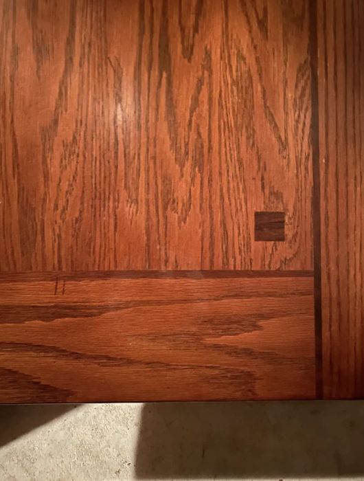 The same wooden table, now completely free from the watermark stain, restored to its original beauty