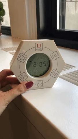 A gif showing a Mytourer tipping the white timer.