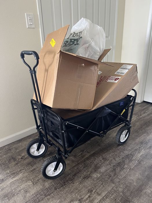 The wagon is pictured filled with several boxes