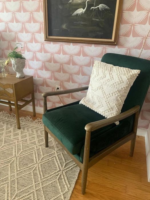The pink peel-and-stick wallpaper on a reviewer’s wall