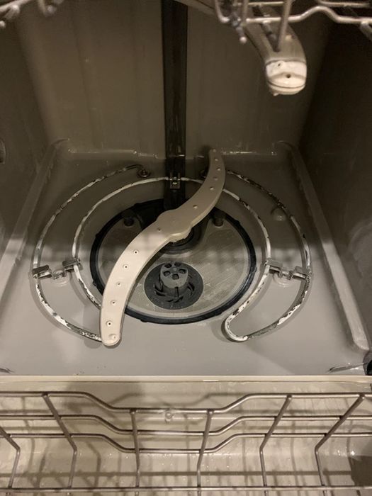 same dishwasher now gleaming after using the tablet 