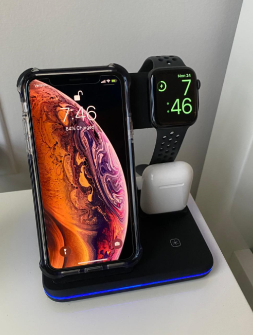 The reviewer’s stand charging three devices simultaneously