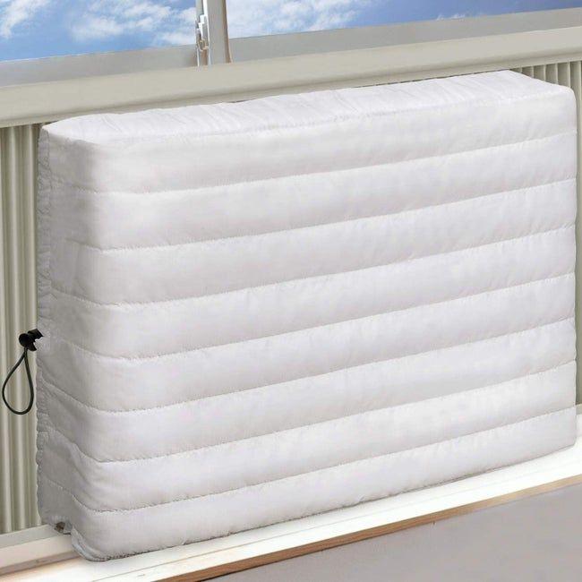 The cover for a window-mounted air conditioner unit.