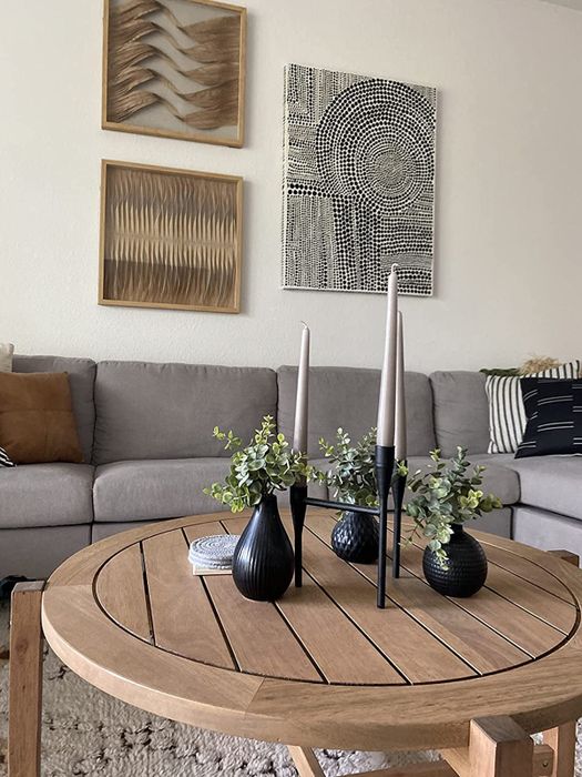 A reviewer’s snapshot showcasing perfectly aligned wall art, easily mounted using this game-changing tool.