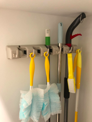 A close-up shot of the row of hooks and hangers.