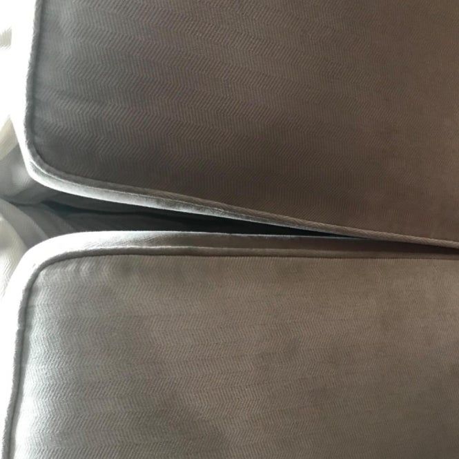The same couch, now spotless and restored, with all traces of the stains completely gone.