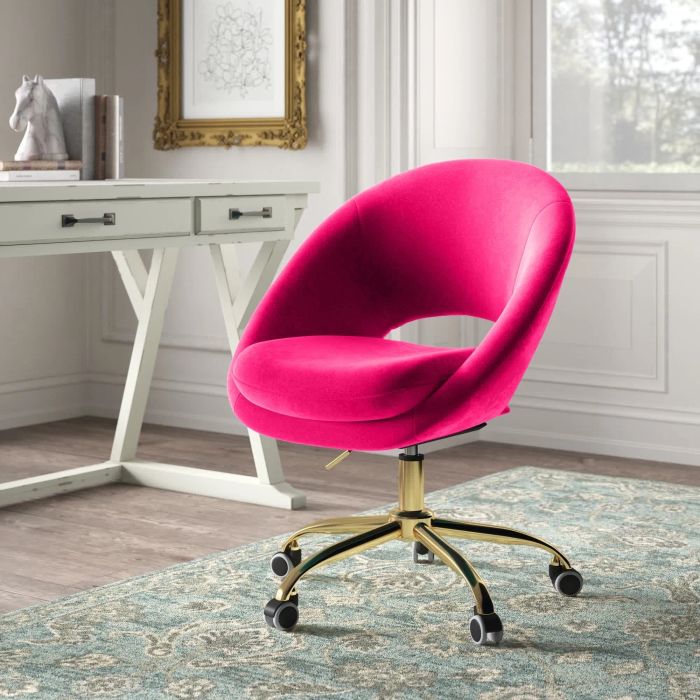 A contemporary velvet desk chair featuring a partially open back and a chic gold base, perfect for enhancing any modern office setup.