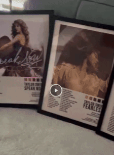 A gif showcasing framed Taylor Swift posters.
