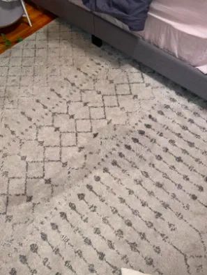 The same rug, now clean and free of the wine stain.
