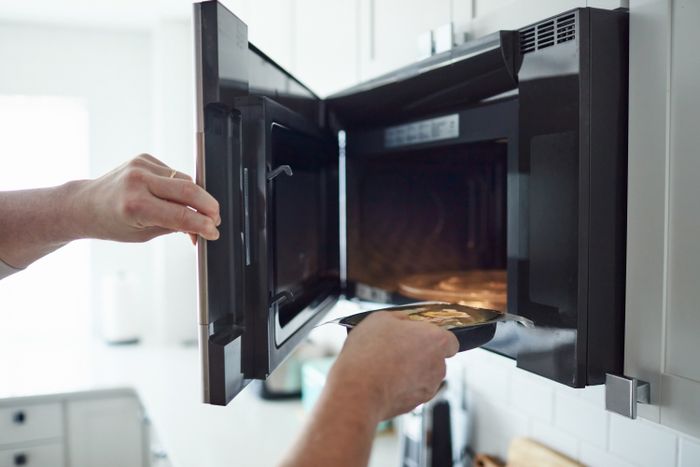 Using a microwave-hood combination to heat food