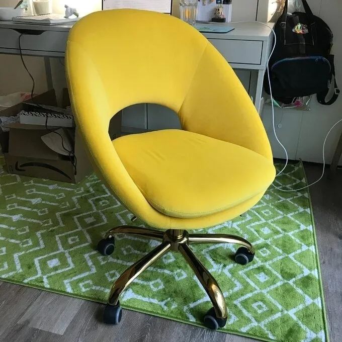 A user-submitted image showcasing the velvet desk chair in a stylish home office, highlighting its plush upholstery and elegant design.