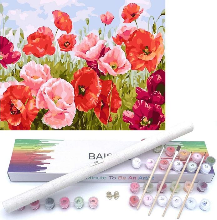 A watercolor painting of pink and red peonies, placed next to an artist’s watercolor set.