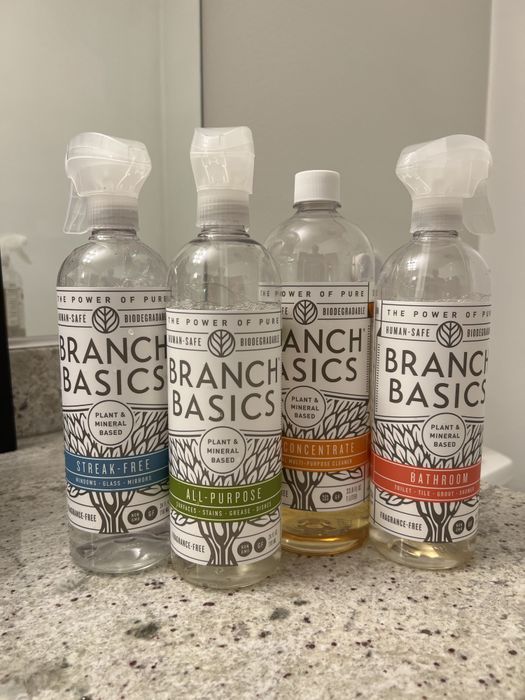 The cleaning essentials kit displayed in a bathroom setting