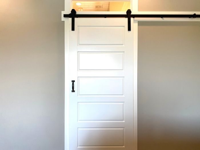 A white sliding barn door