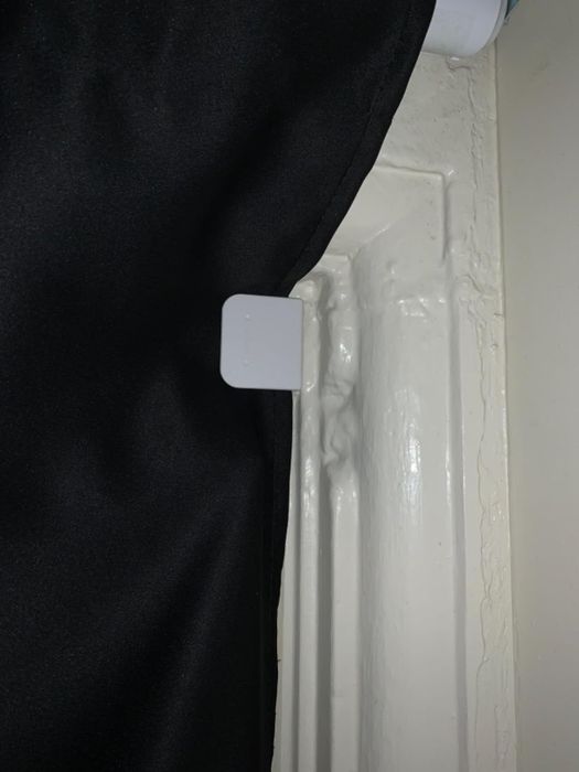 Curtains fastened with clips to the window frame