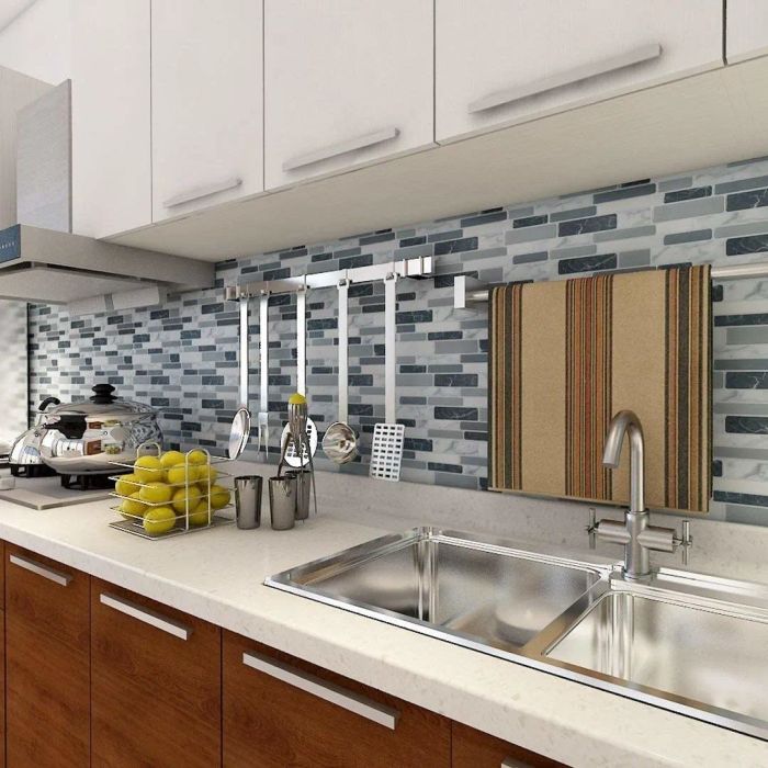 The newly installed backsplash in a kitchen, giving the space a fresh and modern look.