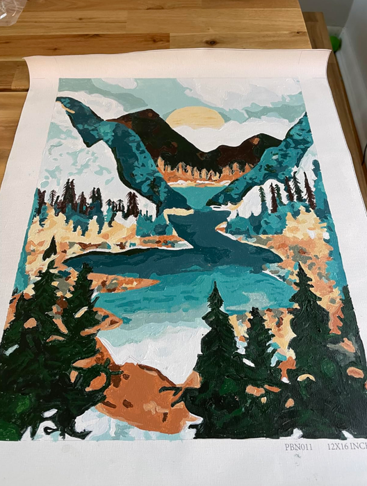 A reviewer’s image showcasing a beautifully completed mountainscape painting.
