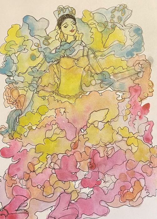 A reviewer’s photo showing a colorful page from the coloring book, featuring lines that form the outline of a princess.