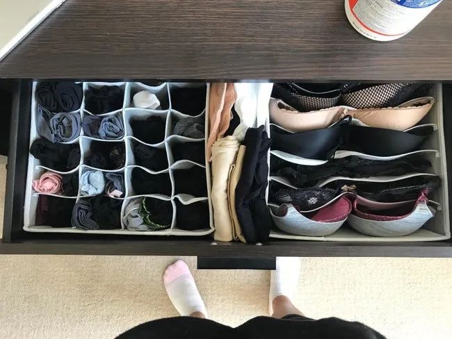 A reviewer photo showing an organized sock and underwear set neatly arranged in a dresser drawer.