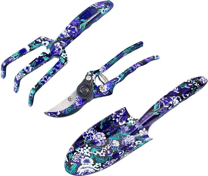 A floral-themed gardening tool set, complete with a fork, pruning shears, and trowel—perfect for gardening lovers