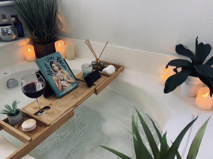 Photo from a reviewer showing a bathtub caddy in a bathroom setting