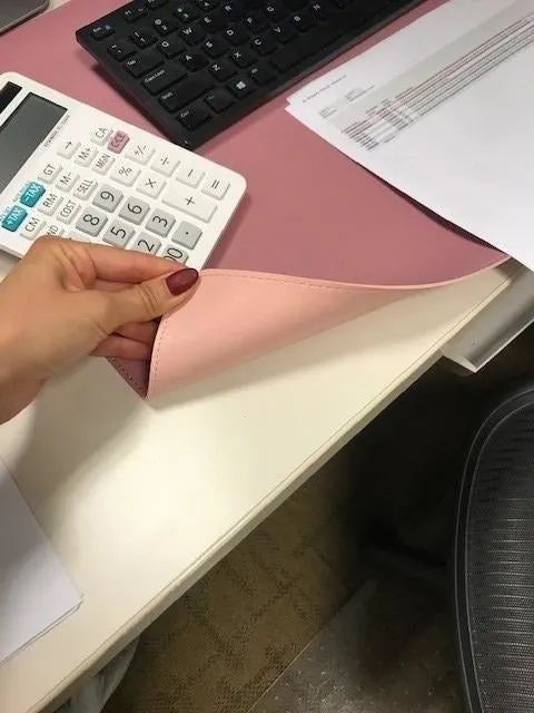 A different reviewer's photo showing the pink mat flipped over to reveal a lighter pink side.