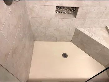 The same shower floor, now spotless and clean.