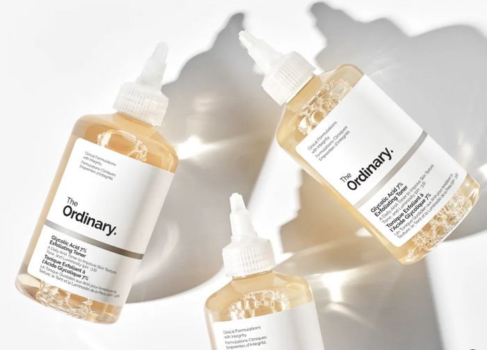 Three bottles of The Ordinary Glycolic Acid 7% Toning Solution displayed at a diagonal angle on a white background.