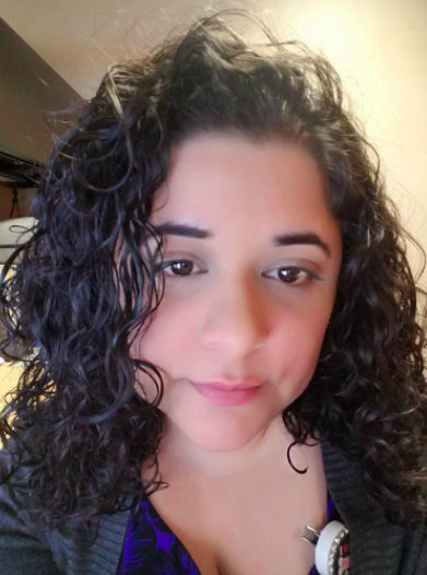 Reviewer with wet curly hair