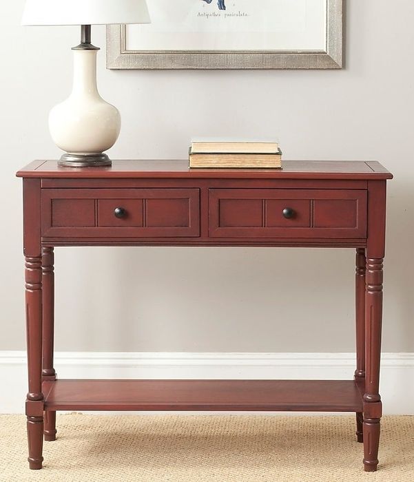 A wooden console table with two drawers