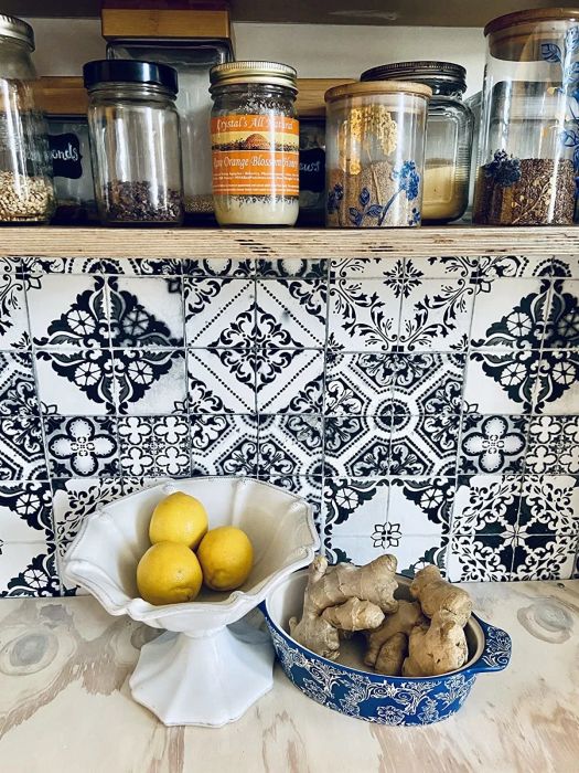 Wallpaper applied to a reviewer's kitchen backsplash, creating a fresh and stylish update.