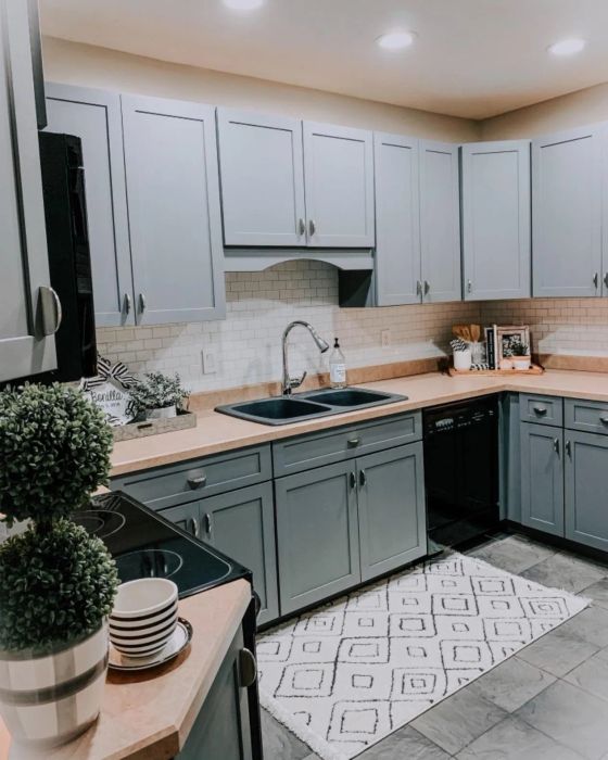 Reviewer's kitchen featuring white subway tile backsplash