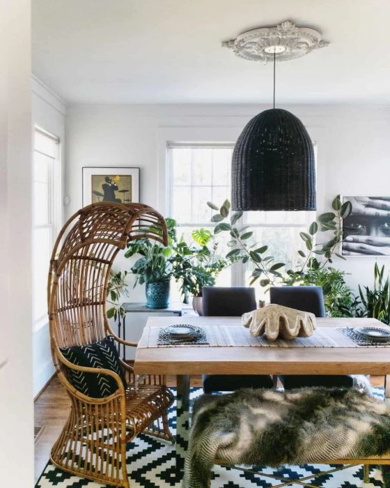 Another reviewer showcases a white ceiling medallion installed above a dining table, keeping the look classic and simple.