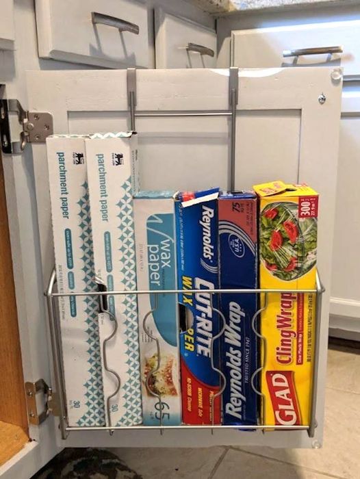 Inside another reviewer’s cabinet, using the shelf to organize storage bags, aluminum foil, and more