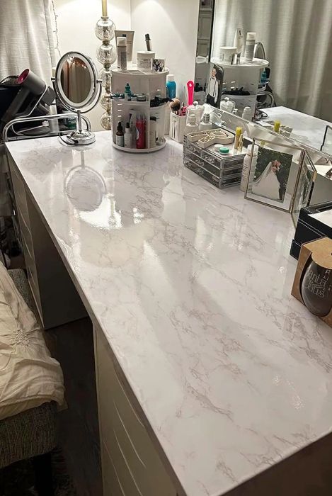 A reviewer's vanity topped with the marble adhesive