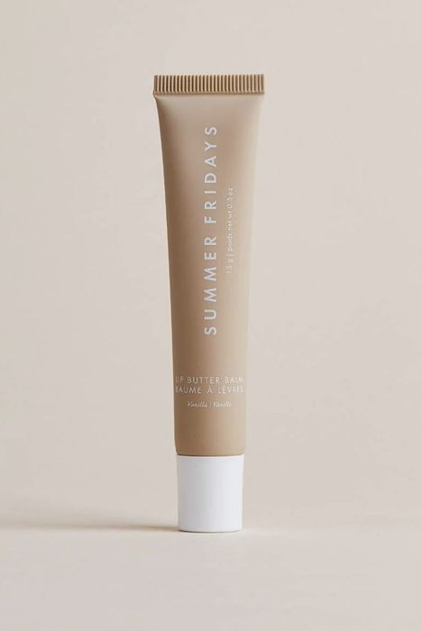 Tube of Summer Fridays lip butter balm standing upright on a neutral background