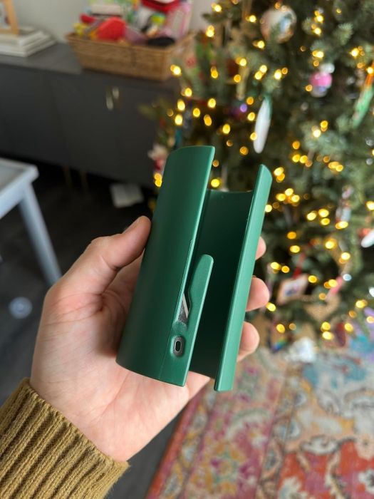 Reviewer holding a gift wrapping cutter