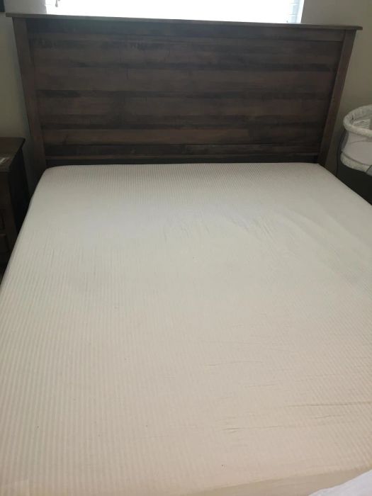 The same sheets smoothly stretched across the mattress