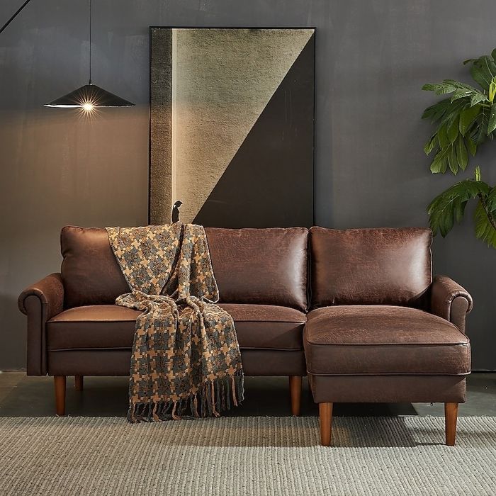 A sofa in the living room, cozy and inviting.