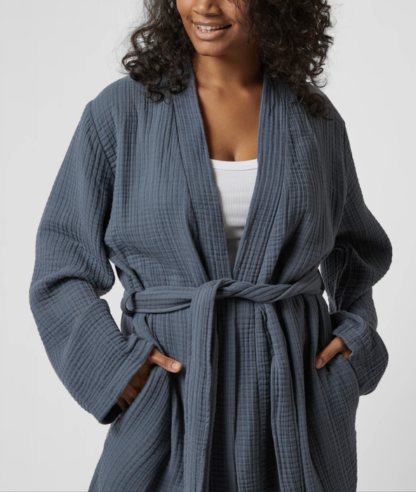 A close-up of the navy robe, highlighting its texture and design.