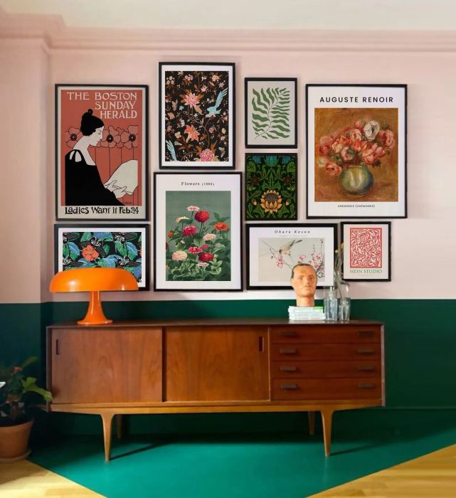 The gallery wall prints are framed and displayed above a media console, creating a dynamic focal point in the room.