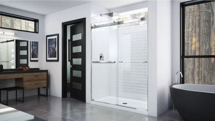 The sleek silver-finished glass shower door