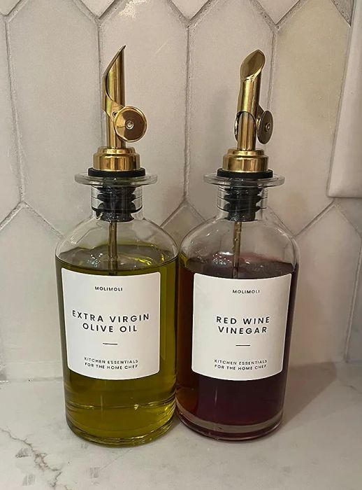 A reviewer's bottles of olive oil and red wine vinegar