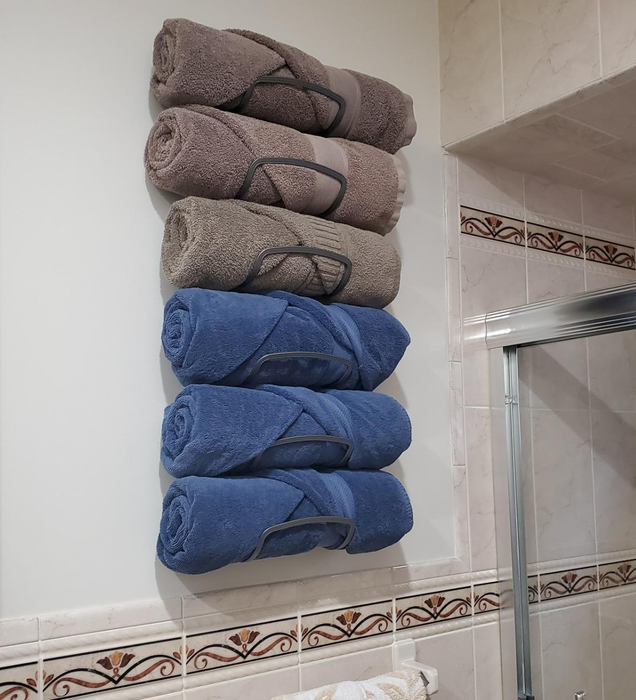 Reviewer’s towel rack displaying six neatly rolled towels