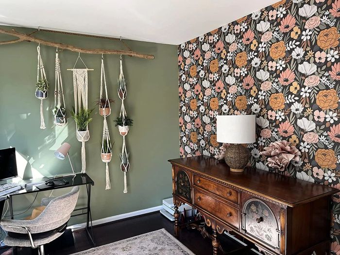 A reviewer's home office, with one wall adorned in beautiful pink, white, and black floral wallpaper.