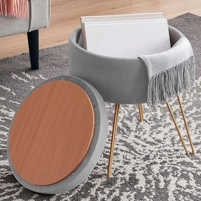 The grey ottoman with the top off to show storage space inside